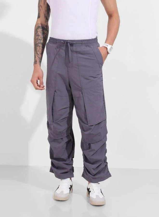 The Indian Garage Co Men Baggy Fit Solid Cross Pocket Mid-Rise Trousers